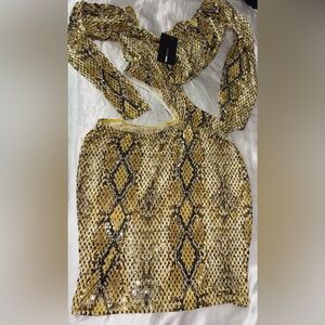 Fashion Nova Yellow and Black Reptile Print Cover
